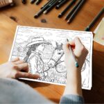 An adult's hands holding colored pencils, carefully coloring a detailed western-themed coloring page. The page features a close-up of a cowgirl wearing a cowboy hat, standing beside her horse and gazing at it, set against a scenic western landscape.